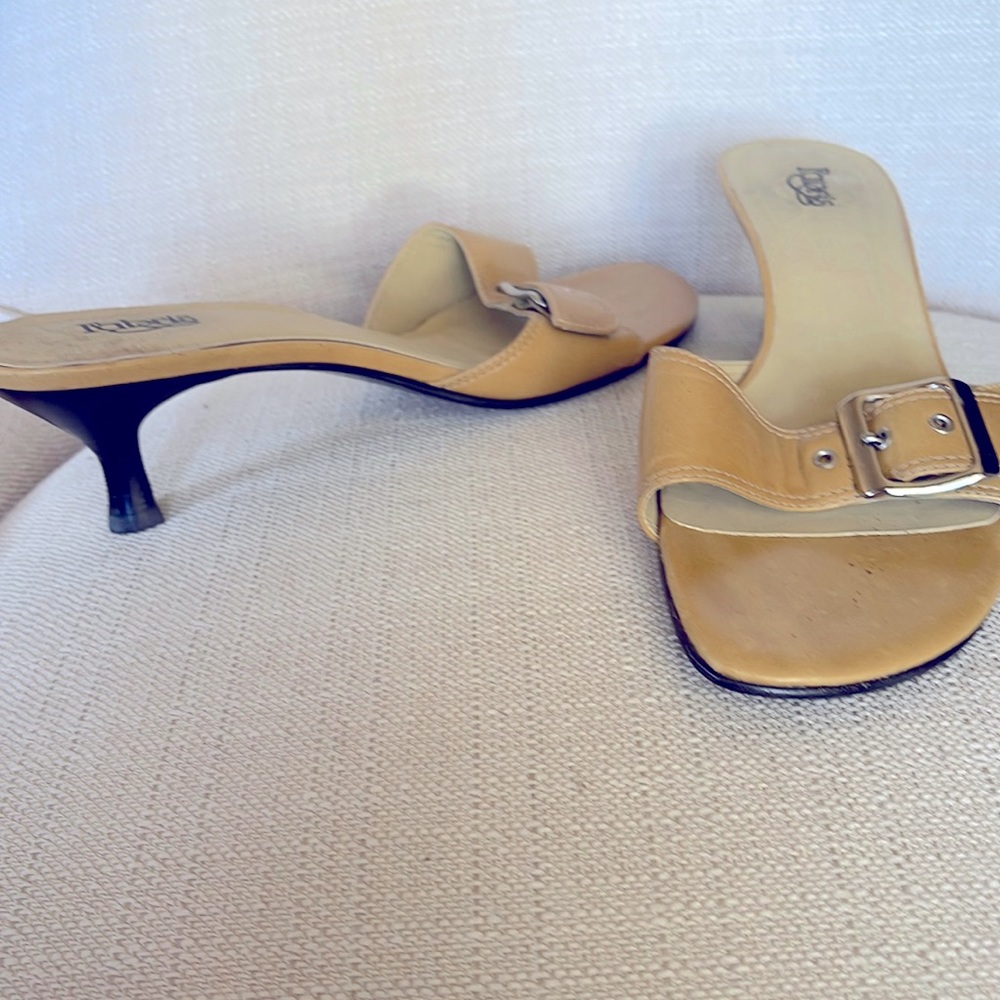 These are cute tan kitten heel shoes.
